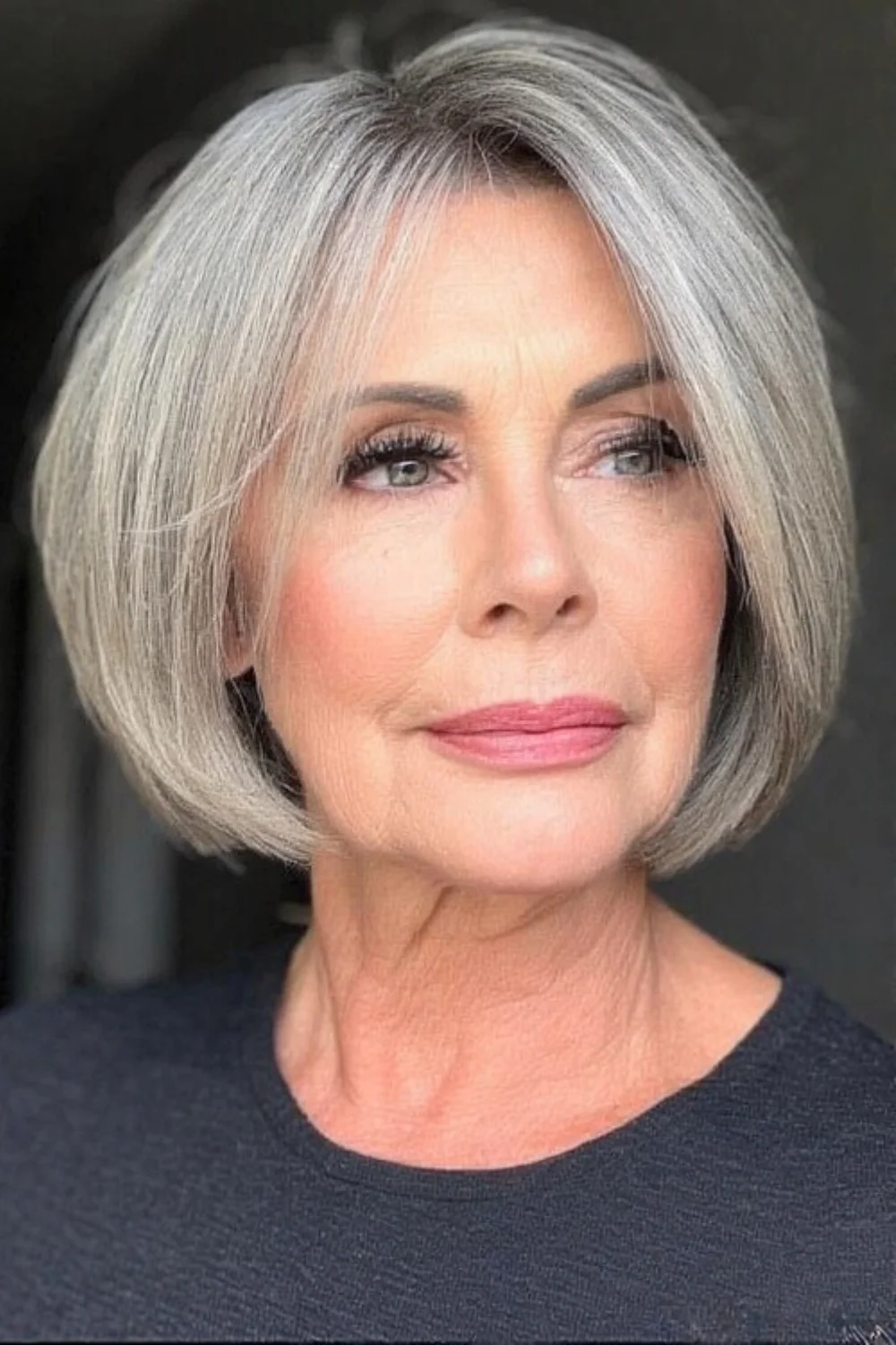 Chin-length bob hairstyle that frames the face beautifully.