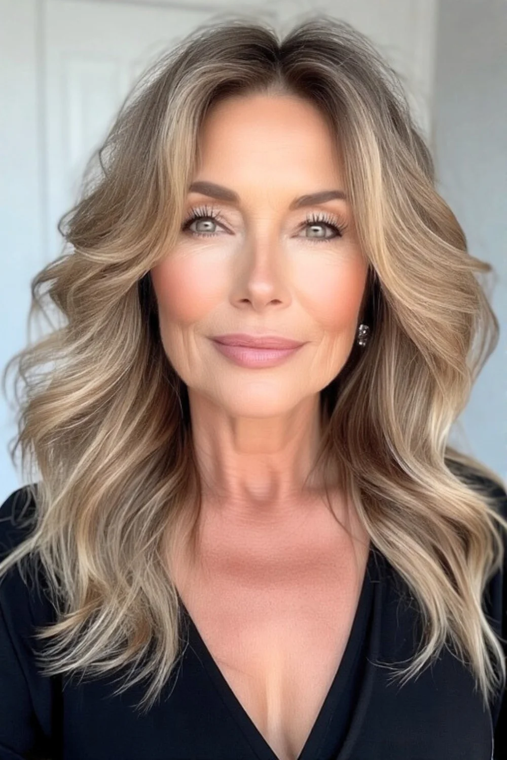 Bob hairstyles with romantic waves for soft, timeless elegance.
