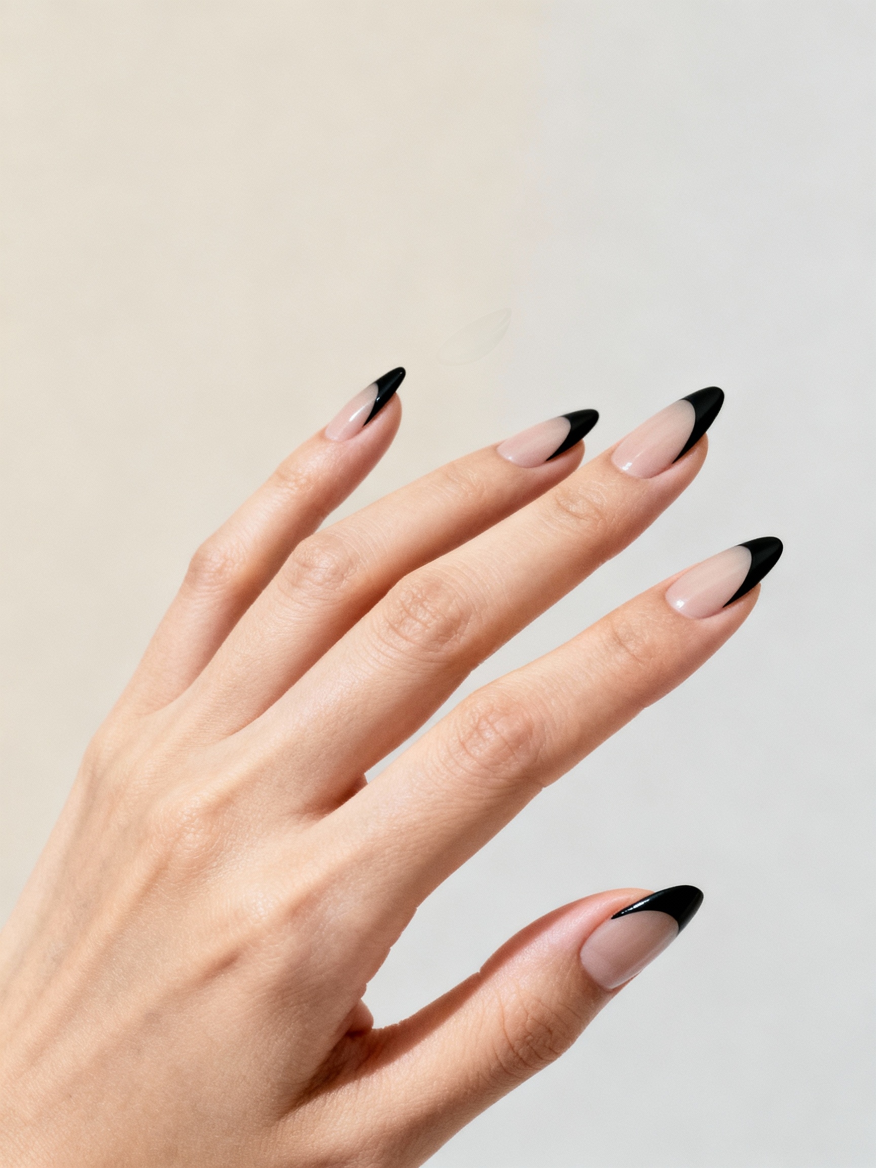 chic black tipped almond nails