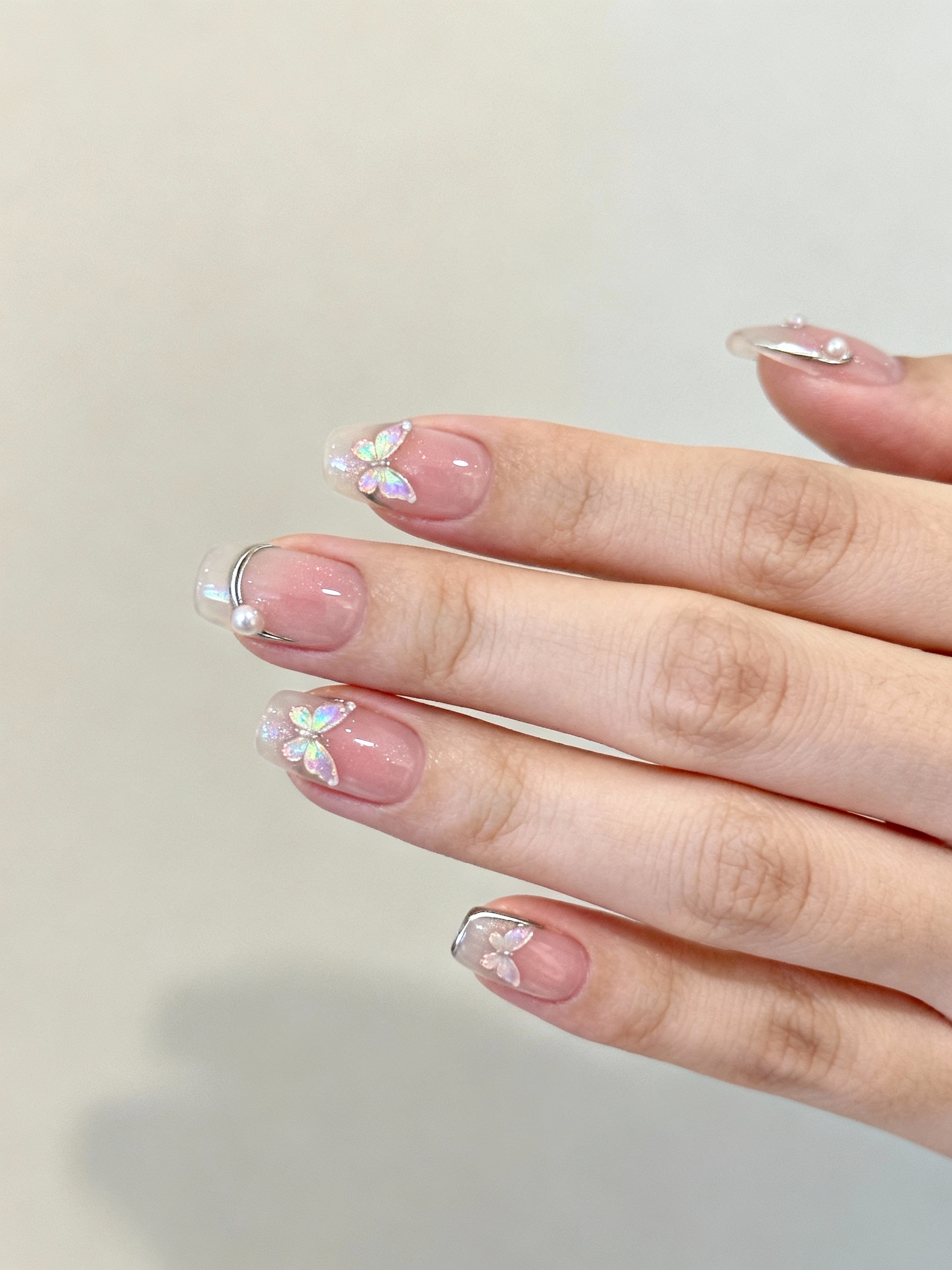 delicate pastel micro butterfly accents