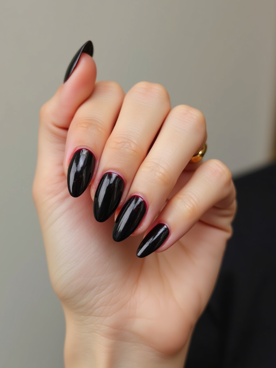 glossy black to burgundy