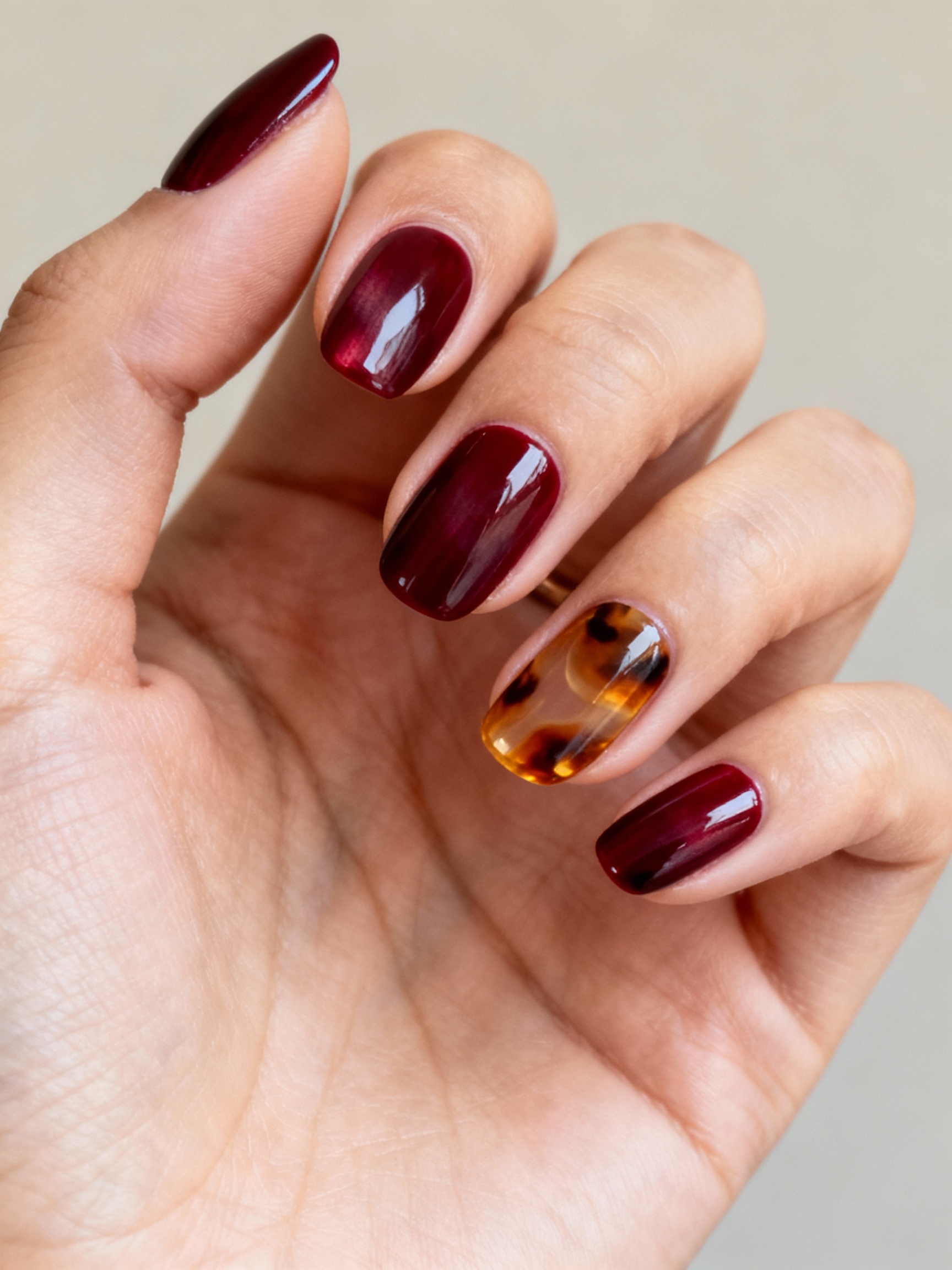 glossy wine tortoiseshell accents