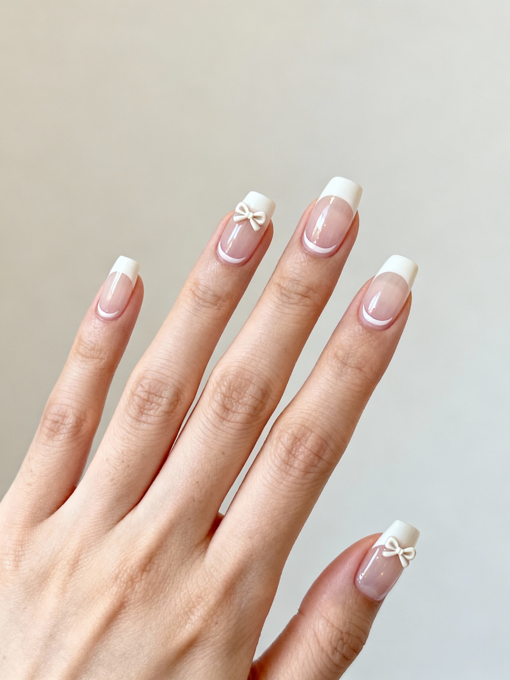 milky french tips petite bows