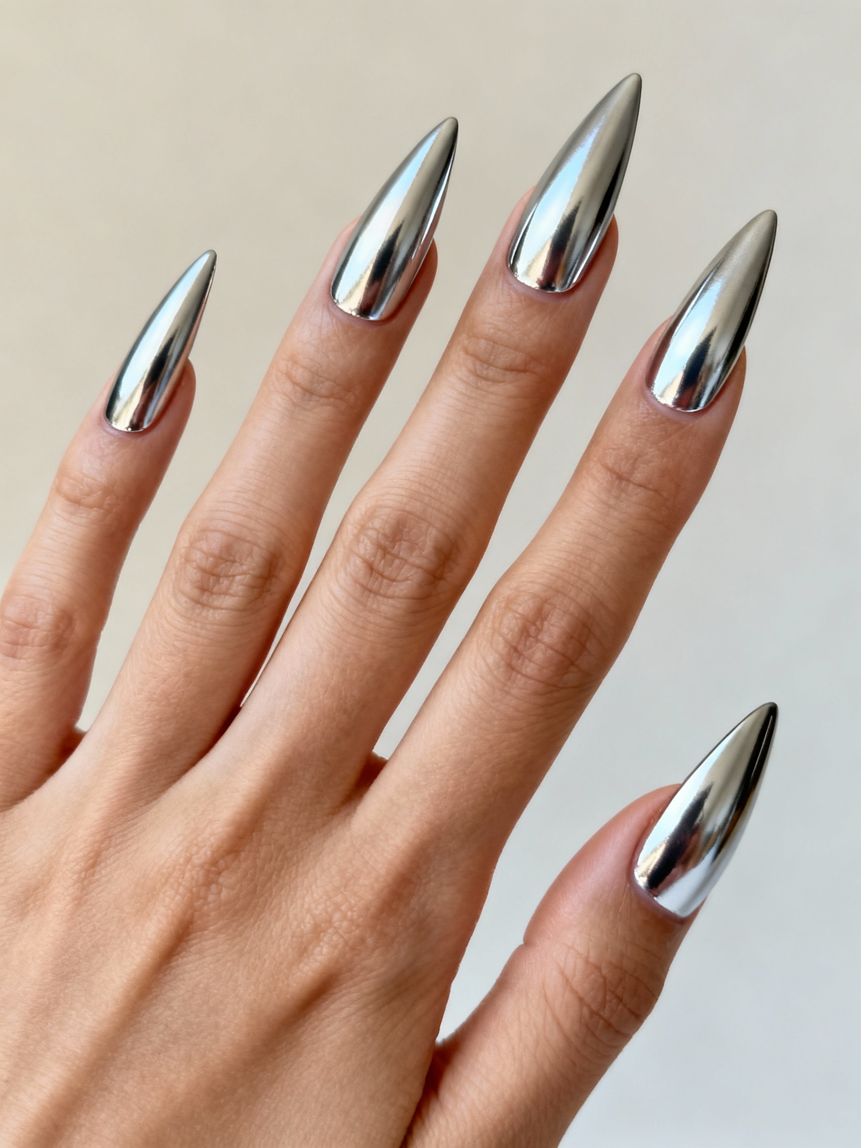 mirror sleek chrome stiletto nails
