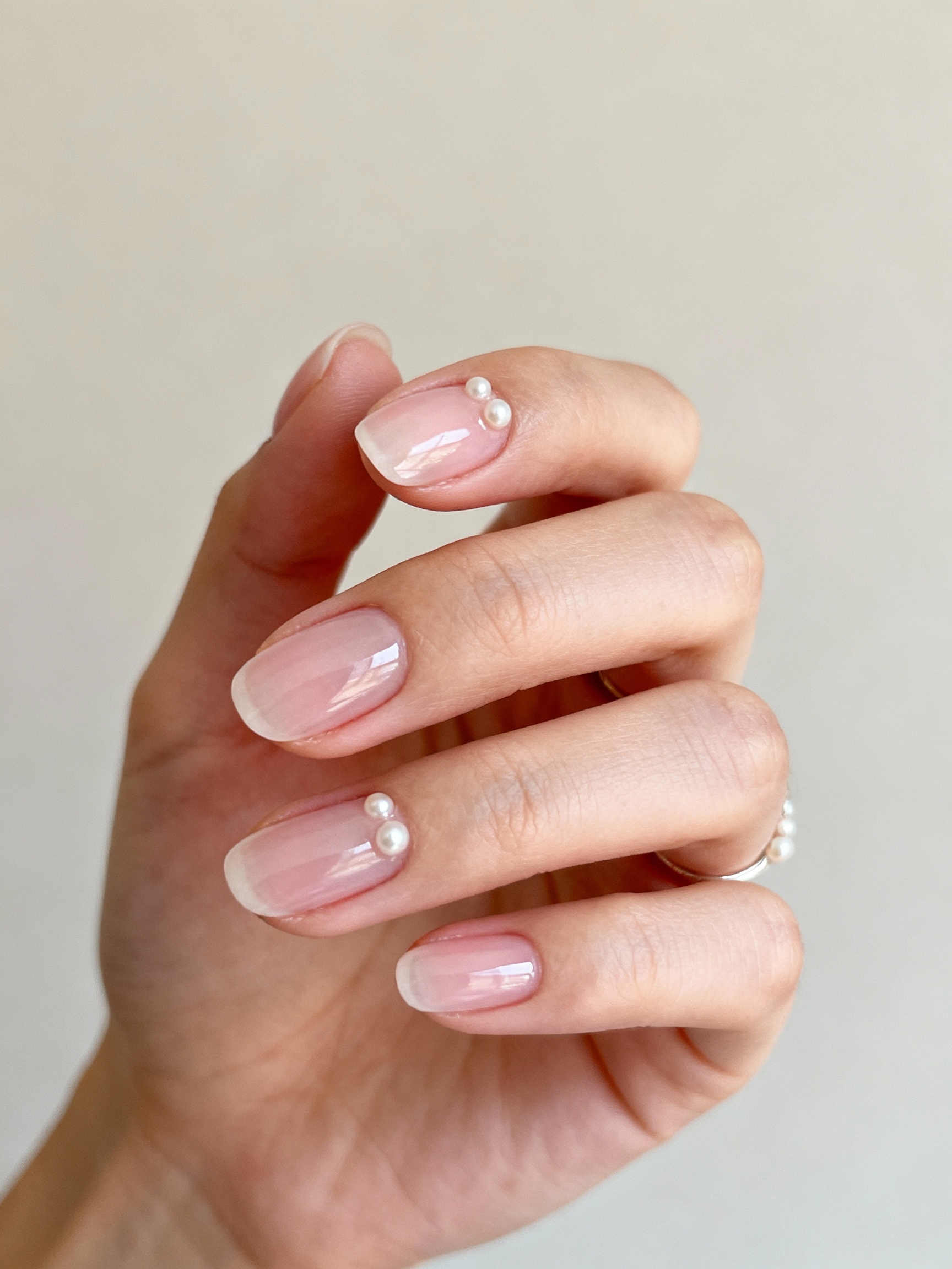 pearl studded sheer pink nails