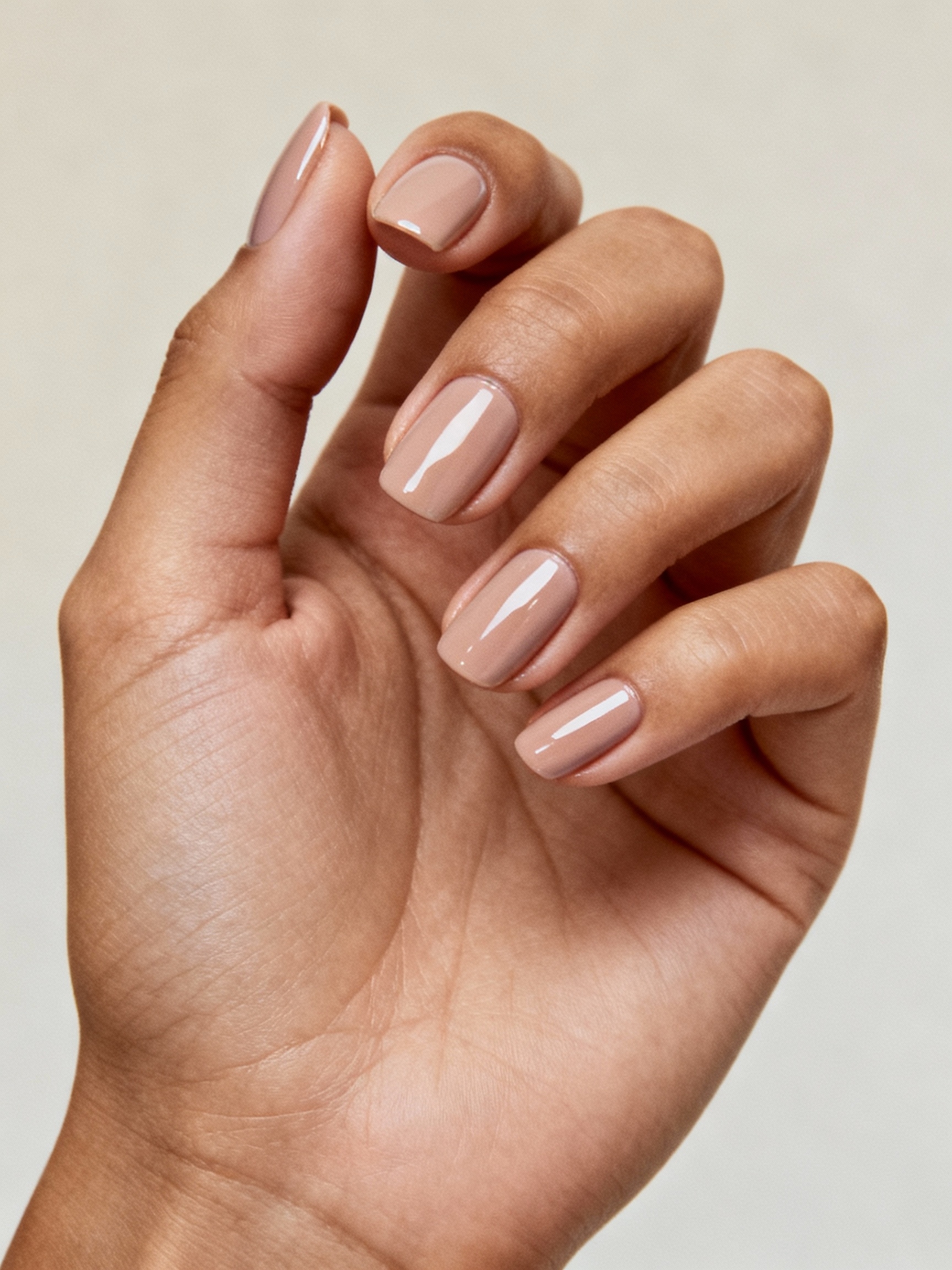 sleek nude pedicure with shine